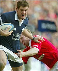 Scotland's Rory Lamont charges over to score