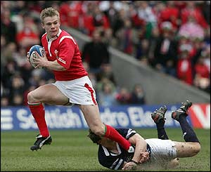 Welsh scrum-half Dwayne Peel makes a break