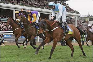 Conor O'Dwyer relaxes in the saddle after winning the Champion Hurdle