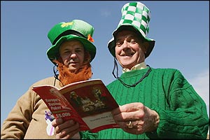 Two Irish fans study the form