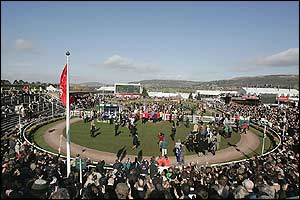 King Harald arrives in the winners' enclosure