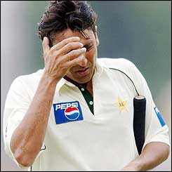 Younis Khan shows his disappointment at getting out but his best-ever score gives Pakistan hope