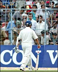 Tendulkar trudges unhappily back to the dressing room and play ends soon afterwards