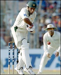 Taufeeq Umar prepares to fend off a delivery