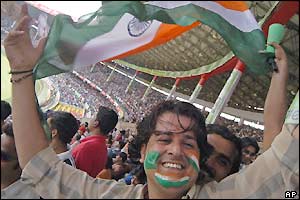 A happy India fan enjoys an action-packed day two