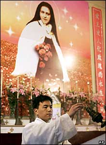 Father Joseph Hou celebrates an Easter mass at St. Theresa's Catholic Church in Shanghai 