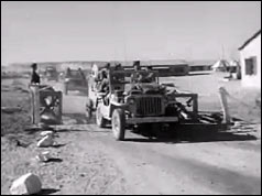 Troops on armoured vehicle 