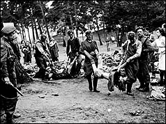 SS men captured at the camp were forced to carry the bodies of their victims