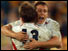 Jonny Wilkinson hugs Will Greenwood