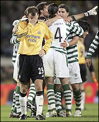 Sporting Lisbon players celebrate booking a place in the Uefa Cup semis