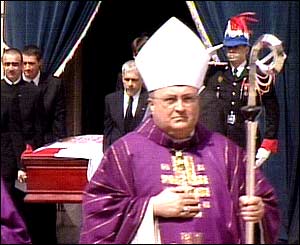 Coffin leaves palace