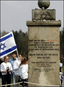 Israeli students gather beside the Jewish Memorial in the former concentration camp of Bergen-Belsen
