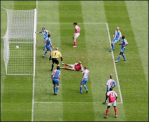 Robert Pires opens the scoring for Arsenal