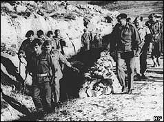 King Hussein walks through frontline trenches between Israel and Jordan