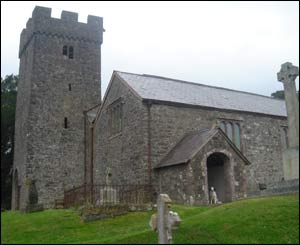 A picture of Llangathen church, with Owain Rowlands' dog Snoop in the porch 