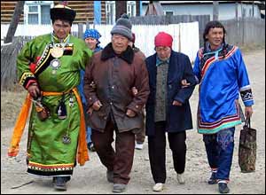 The shaman's grandfather (second left) before the initiation ceremony