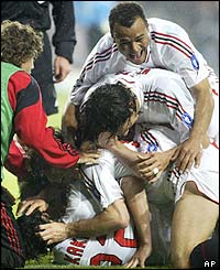 AC Milan's Massimo Ambrosini celebrates scoring