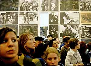 Visitors walk through the exhibition at the Yad Vashem Holocaust Museum in Jerusalem