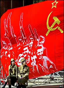 Young members of a military history club, dressed in Soviet wartime uniform, wait their turn to perform in a concert in Moscow.