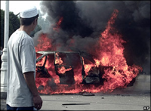 A car burning in the Uzbek town of Andijan