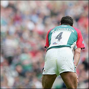 A dejected Martin Johnson contemplates defeat