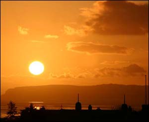 The sun rising over the great Orme from Upper Bangor, taken by Andreas Daniel from Bangor, living in Cardiff.