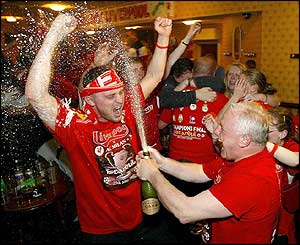 Liverpool supporters' club members celebrate Liverpool's Champions League success