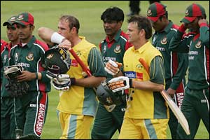 The teams leave the Old Trafford pitch
