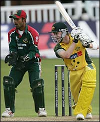 Michael Clarke hits a four