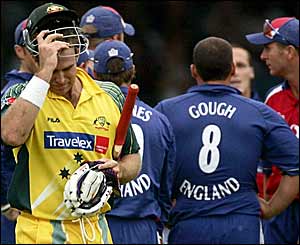 Matthew Hayden departs after being caught by Ashley Giles off Darren Gough's bowling