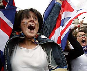 A woman celebrates London's successful Olympic bid