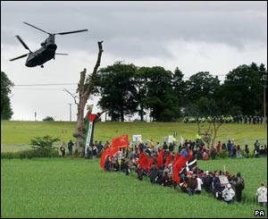 Helicopter flies over protesters
