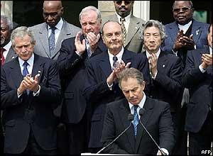 G8 leaders give Tony Blair a round of applause following his statement on aid for Africa