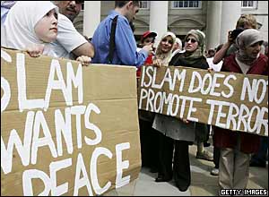 Members of the Muslim community in Leeds mark the vigil in Millennium Square