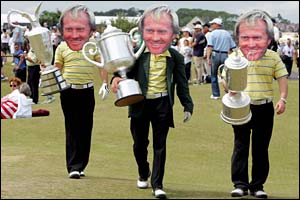 Three Jack Nicklaus' fans walk the course in masks