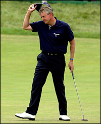 Colin Montgomerie acknowledges the crowd