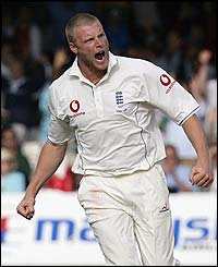  Flintoff claims the crucial wicket of Adam Gilchrist