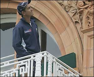 Justin Langer inspects the sky from the Lord's pavilion