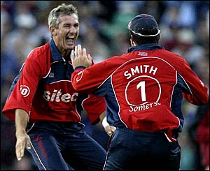 Andrew Caddick is congratulated by Graeme Smith