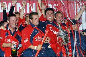Smith and his Somerset team-mates celebrate with the trophy