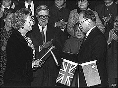 Mrs Thatcher and Zhao Ziyang holding formal handover documents