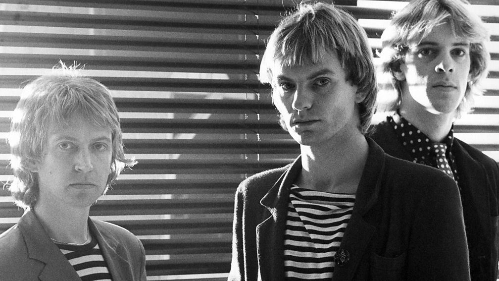 The Police, featuring Andy Summers (left)