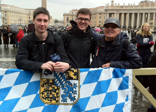 Three pilgrims have front row position