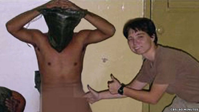 US service personnel humiliating prisoner