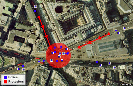 Police wearing high-visibility jackets begin to form a cordon around the crowd