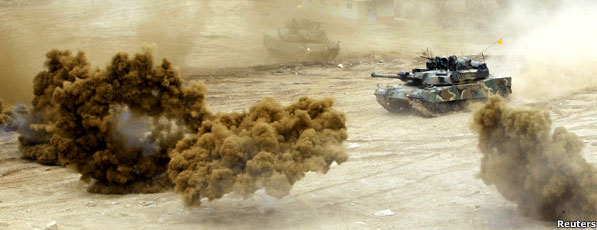 South Korean soldiers participate in military drills near the demilitarized zone separating the two Koreas in Cheorwon