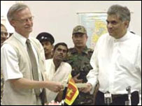 Wickramasinghe handing over the signed CFa to Norwegian ambassador