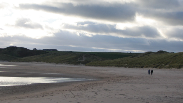 The wide sandy beach is a popular local attraction.