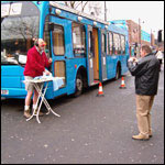 Ian ironing at Blue Bus