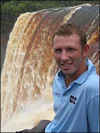 Andrew White in front of the Kaieteur Waterfalls
